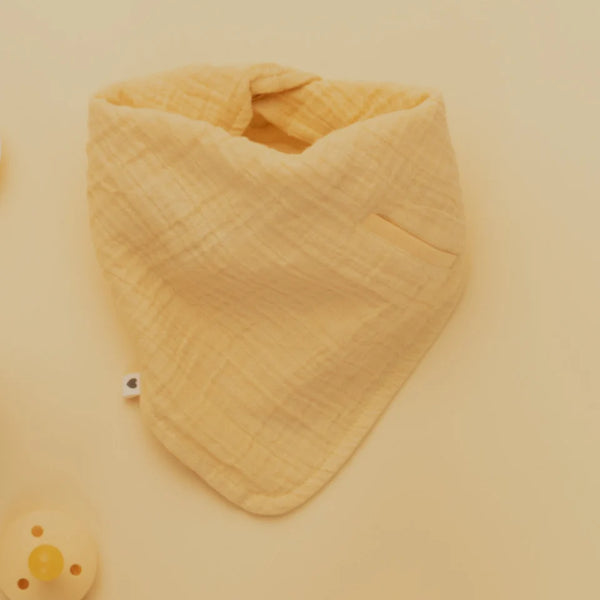 BIBS Bandana Bib - Pale Butter flatlay