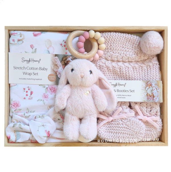 ROOM TO BLOOM Alice Baby Gift Hamper set with plush toy, swaddle and other items in a wooden box.