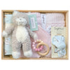 ROOM TO BLOOM Anastasia Baby Gift Hamper set with plush toy, blanket, teething ring, and more in a wooden box.