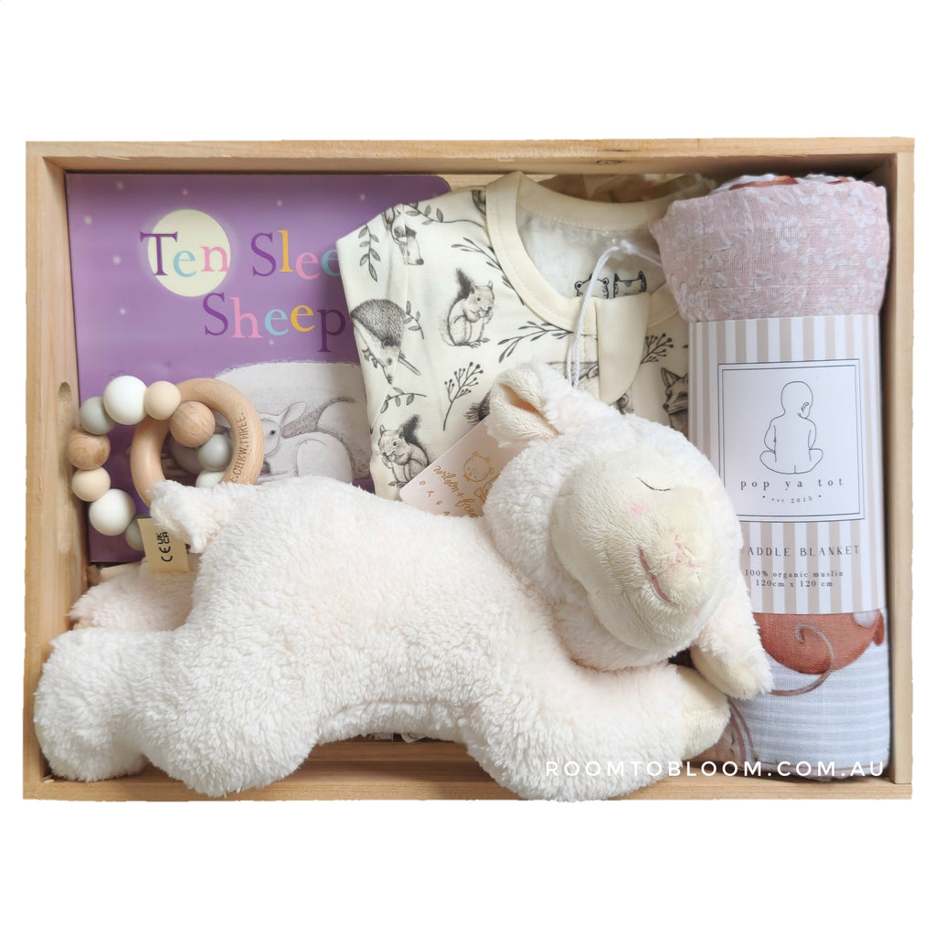ROOM TO BLOOM Animal Babies Baby Gift Hamper set with plush toy, teether, clothing and more in a wooden box.