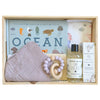 ROOM TO BLOOM Aqua Girl Baby Gift Hamper set with 'Ocean' themed items and bath products in a wooden box.