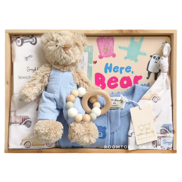 ROOM TO BLOOM Bear in There Baby Gift Hamper set with teddy bear, rattle, and more in a wooden box.
