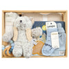 ROOM TO BLOOM Big Dreams Baby Gift Hamper set arranged in a light wood box, featuring a plush grey stuffed bear, light blue knit baby socks, a grey knit blanket, wooden and blue beads, a patterned muslin swaddle, a beanie and a picture book. 