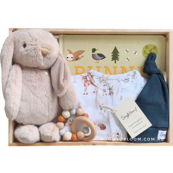 ROOM TO BLOOM Busy Bunnies Baby Gift Hamper set with plush toy, teether, and clothing and more in a wood box.
