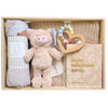 ROOM TO BLOOM Cinnamon Baby Gift Hamper set with plush toy, teether, milestone cards, and other items in a wooden box.