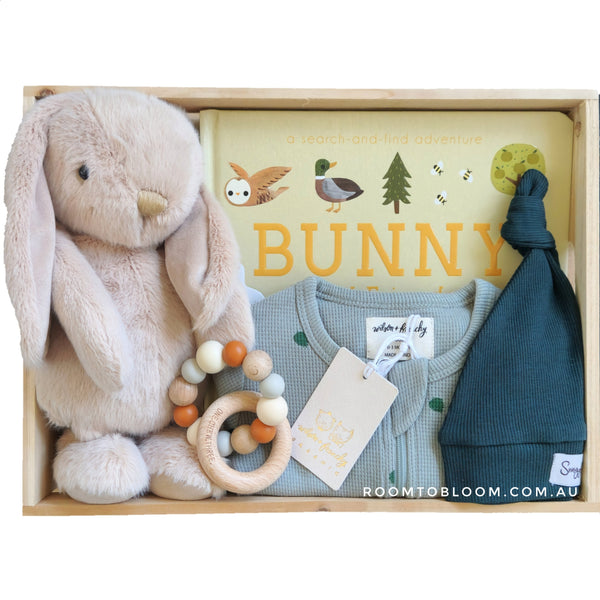 ROOM TO BLOOM Clover Baby Gift Hamper set with plush toy, clothing, and accessories in a box.