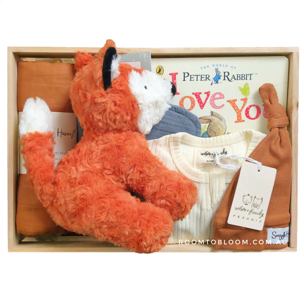ROOM TO BLOOM Curous Creatures Baby Gift Hamper set with plush fox, baby clothes, a picture book and more in a wooden box.