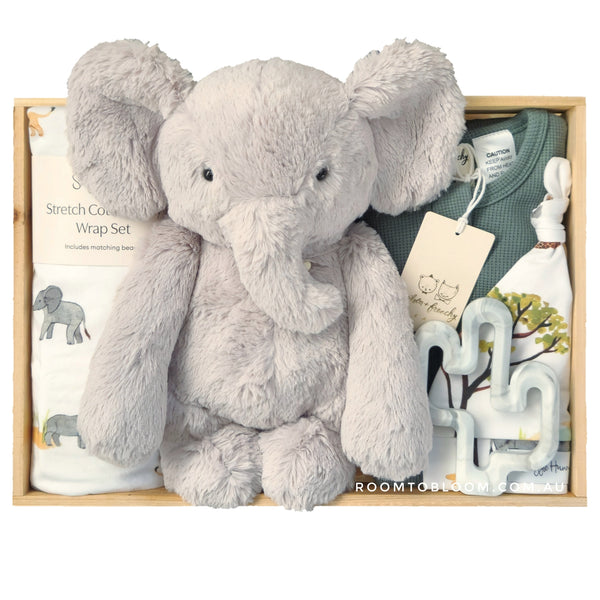 ROOM TO BLOOM Ellie Elephant Baby Gift Hamper with elephant plush toy other baby items in a box.