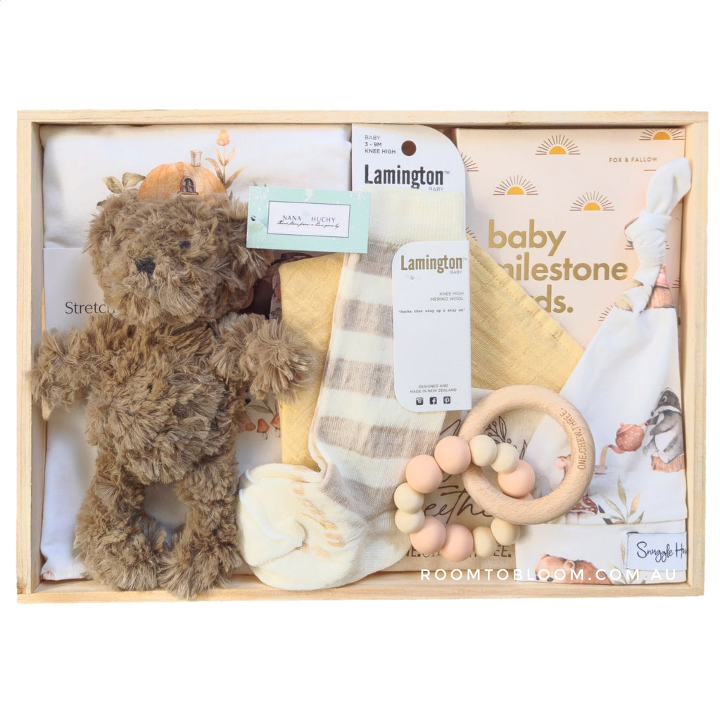 ROOM TO BLOOM Enchanted Forest Baby Gift Hamper gift set with teddy bear, swaddle, and teething ring and more in a wooden box.