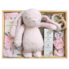 ROOM TO BLOOM Flowering Gum Baby Gift Hamper set with plush bunny, balm, and other items in a wooden box.