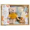 ROOM TO BLOOM Howdy Baby Gift Hamper set in a wooden box, featuring a plush teddy bear in a yellow knit sweater, a light blue denim overall and tee, a stretch cotton wrap and beanie set with cowboy print, wooden teething ring, and a bandana bib.