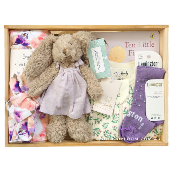 ROOM TO BLOOM Lavender Love Baby Gift Hamper set with bunny, socks, and other items in a wooden box
