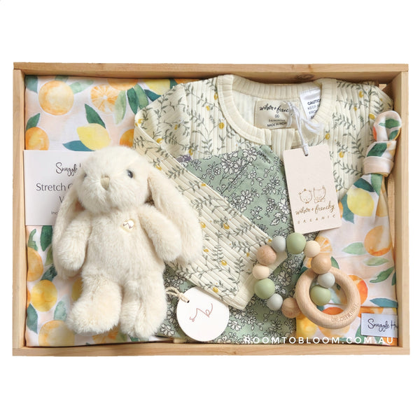 ROOM TO BLOOM Lemon Love Baby Gift Hamper set with plush toy, clothing, teether and more in a wooden box.
