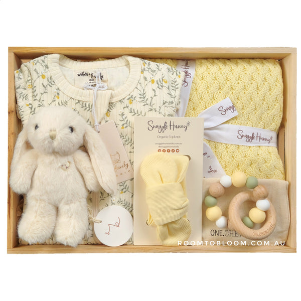 ROOM TO BLOOM Lemon Thyme Baby Gift Hamper Baby gift set with plush toy, blanket, and rattle and more in a wooden box.