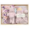 ROOM TO BLOOM Lisianthus Baby Gift Hamper gift set with plush bunny, blanket, and booties in a wooden box.