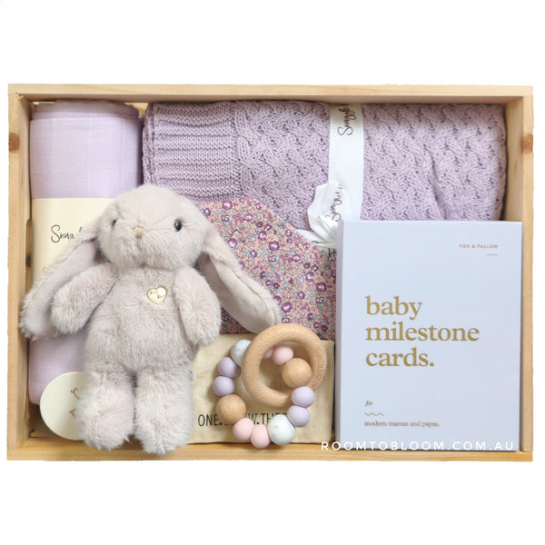 ROOM TO BLOOM Lovely Lilac Baby Gift Hamper set with plush bunny, teething ring, milestone cards and more in a wooden box.