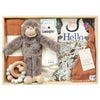 ROOM TO BLOOM Monkey Around Baby Gift Hamper set with plush toy, baby clothes, toys and more in a wooden box.