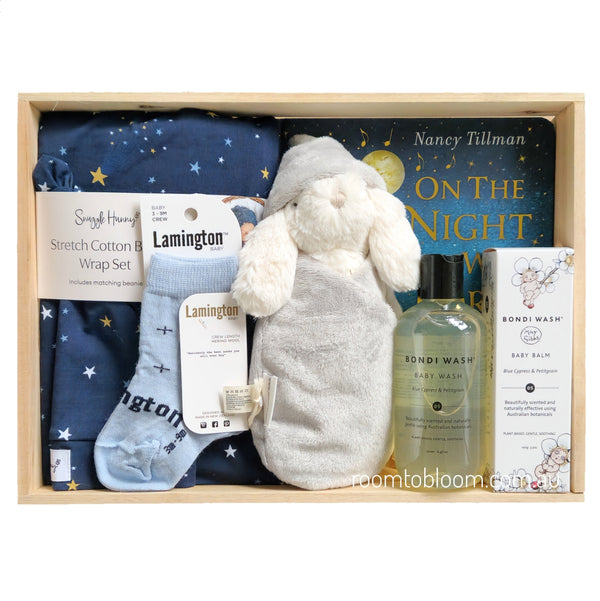 ROOM TO BLOOM Night Sky Baby Gift Hamper set with swaddle and beanie, book, bath items and more in a box.