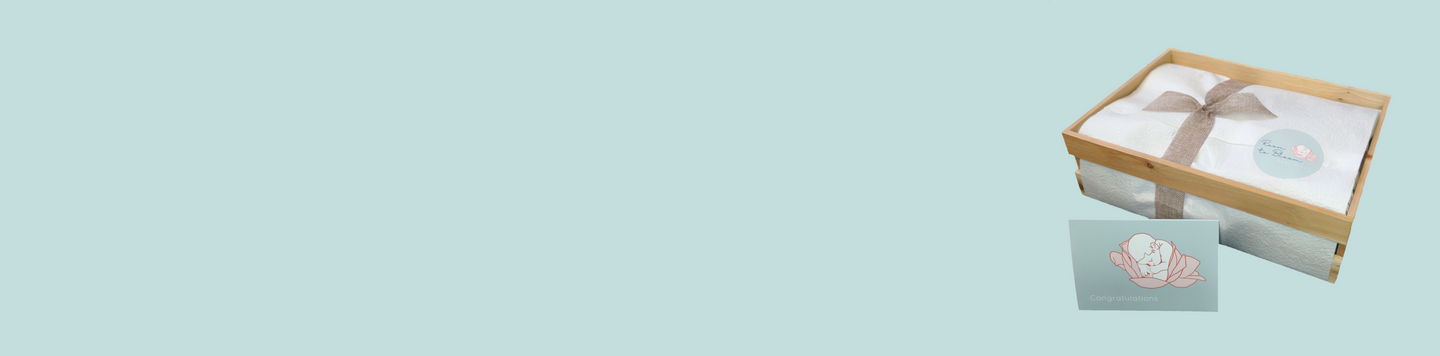 ROOM TO BLOOM Gift box with a card on a light blue background