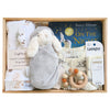 ROOM TO BLOOM Starry Starry Night Baby Gift Hamper set with swaddle, plush bunny, rattle, Nancy Tillman's 'On the Night You Were Born' book, and more in a wooden box.