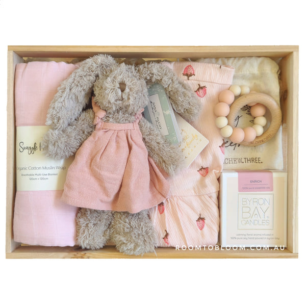 ROOM TO BLOOM Strawberry Kisses Baby Gift Hamper set with plush toy, swaddle, toy and more in a wooden box.