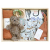 ROOM TO BLOOM Wild One Baby Gift Hamper set with teddy bear, baby clothes, toys and more in a wooden box.