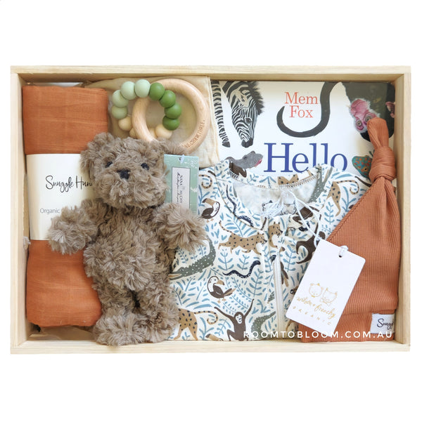 ROOM TO BLOOM Wild One Baby Gift Hamper set with teddy bear, baby clothes, toys and more in a wooden box.