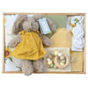 ROOM TO BLOOM You Are My Sunshine Baby Gift Hamper containing a Bunny in a yellow dress with a blanket and more in a wooden box.