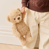 Person holding a SNUGGLE BUNNIES Arthur the Bear in a home setting