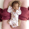 SNUGGLE HUNNY Organic Snugglesuit Convertible Romper with Frill - Alice's Tea Party front lifestyle