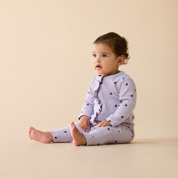 WILSON & FRENCHY Organic Waffle Ruffle Zipsuit - Berry Plums lifestyle