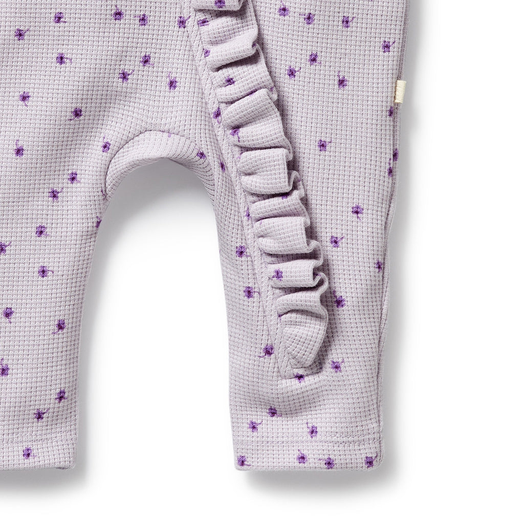 WILSON & FRENCHY Organic Waffle Ruffle Zipsuit - Lulu Daisy leg detail