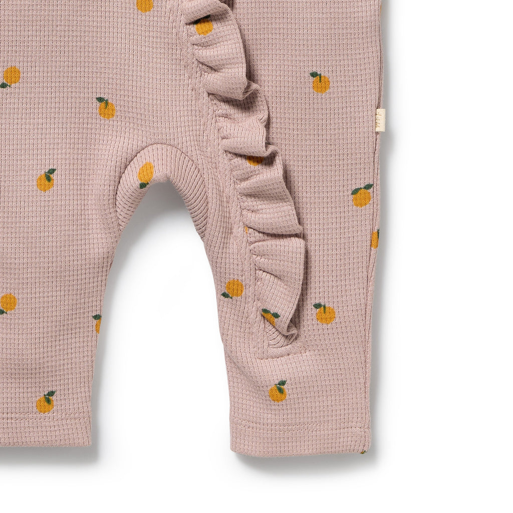 WILSON & FRENCHY Organic Waffle Ruffle Zipsuit - Mini Mando leg detail